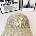 Dior cap in beige monogram fabric with raised Dior logo embroidery, top view.