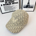 Dior cap in beige monogram fabric with raised Dior logo embroidery, side view.