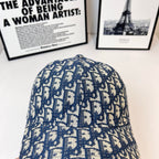Dior baseball cap with domed top and blue-and-white monogram print, curved brim.