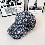 Dior baseball cap with blue-and-white monogram pattern, curved brim and panel seams.