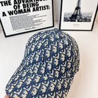 Dior baseball cap with blue-and-white monogram pattern, structured crown and curved brim.