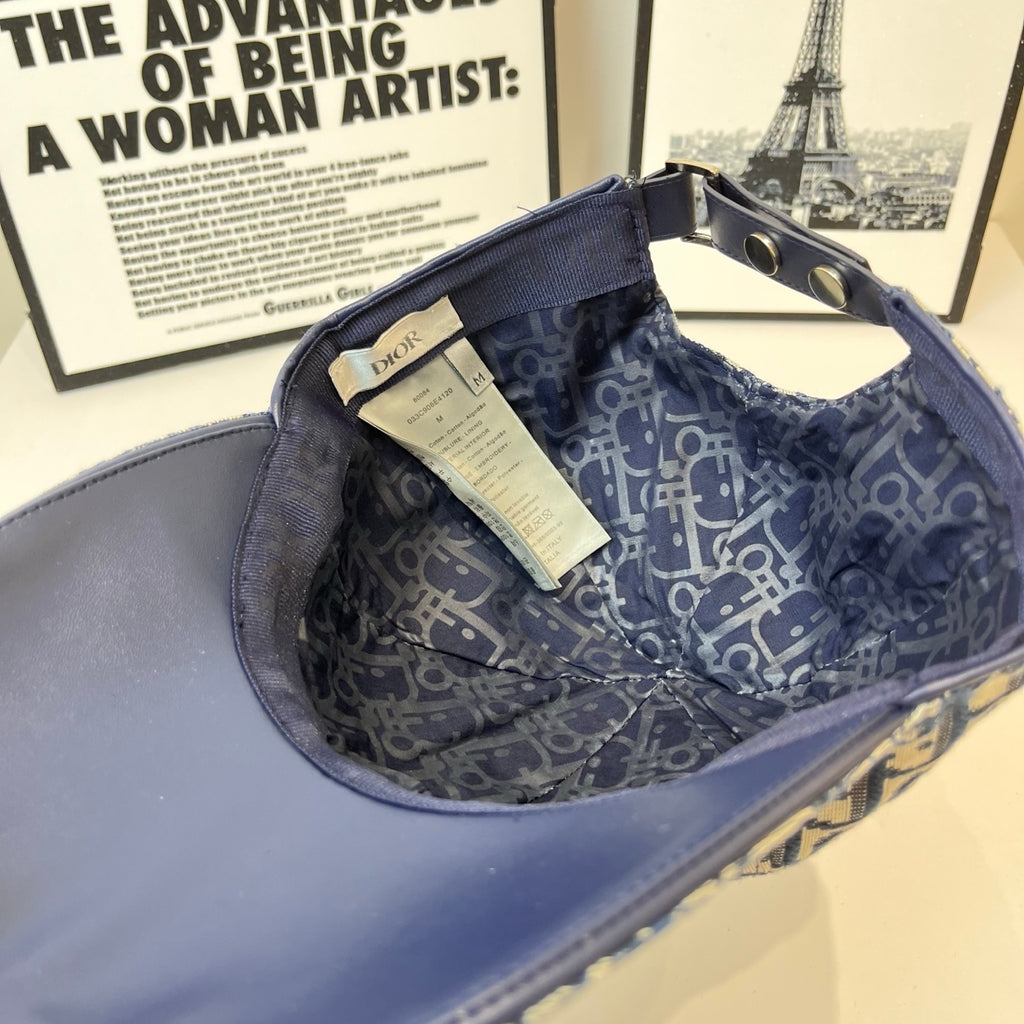 Dior cap interior with dark-blue lining and adjustable strap with tag