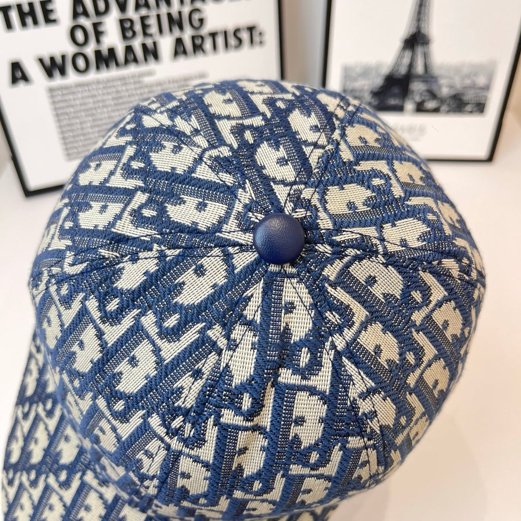 Dior cap with blue patterned crown and round top button