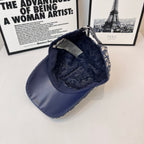 Dior cap with curved brim and dark-blue interior lining, side view