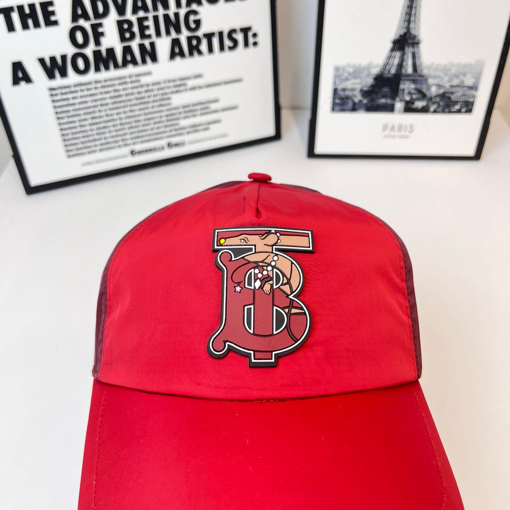 Red baseball cap with front embroidered monogram logo on crown