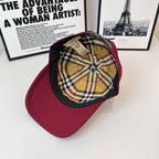 Burberry cap interior and exterior view with plaid lining and dark brim trim