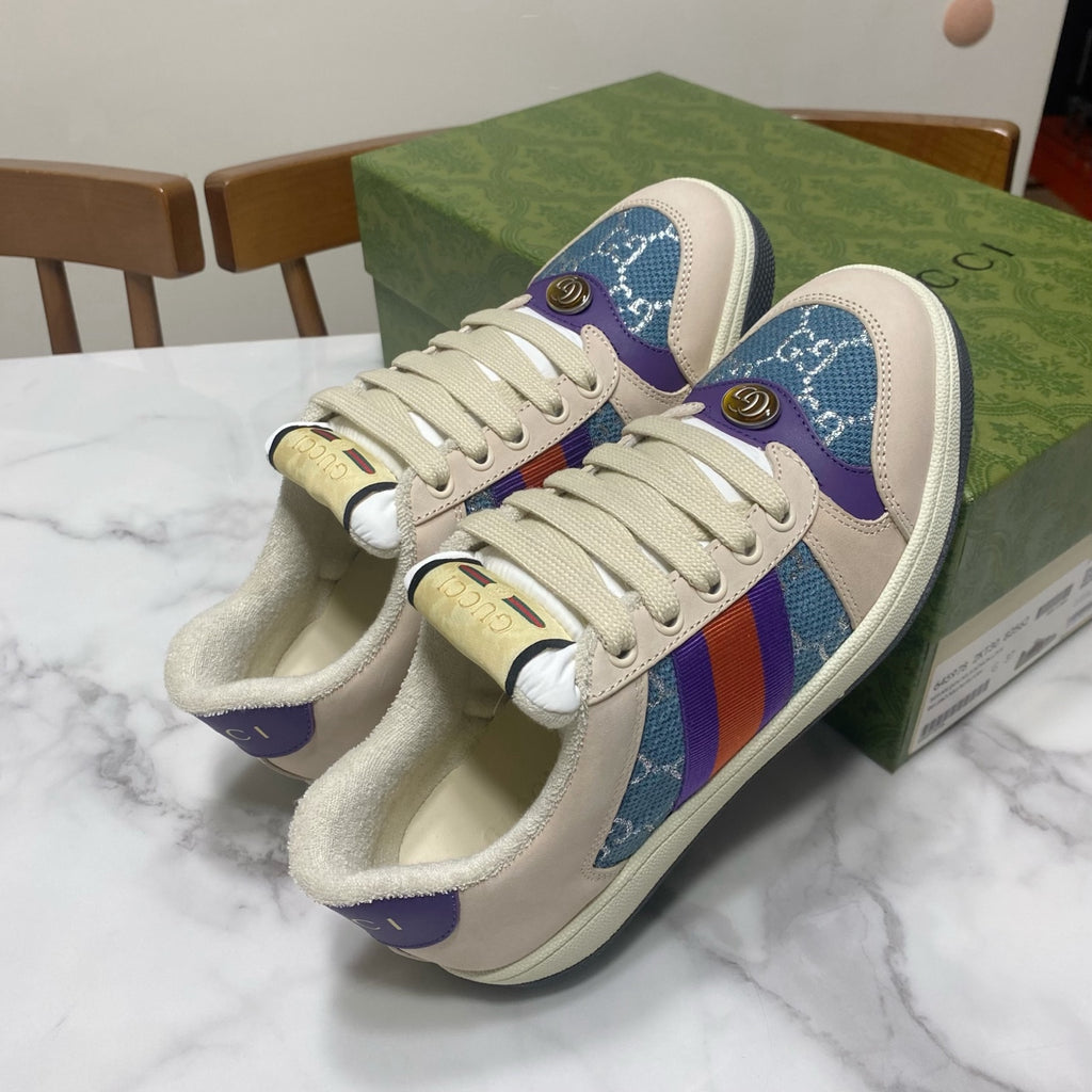 Gucci unisex sneakers with cream uppers and blue patterned sides with rainbow stripe