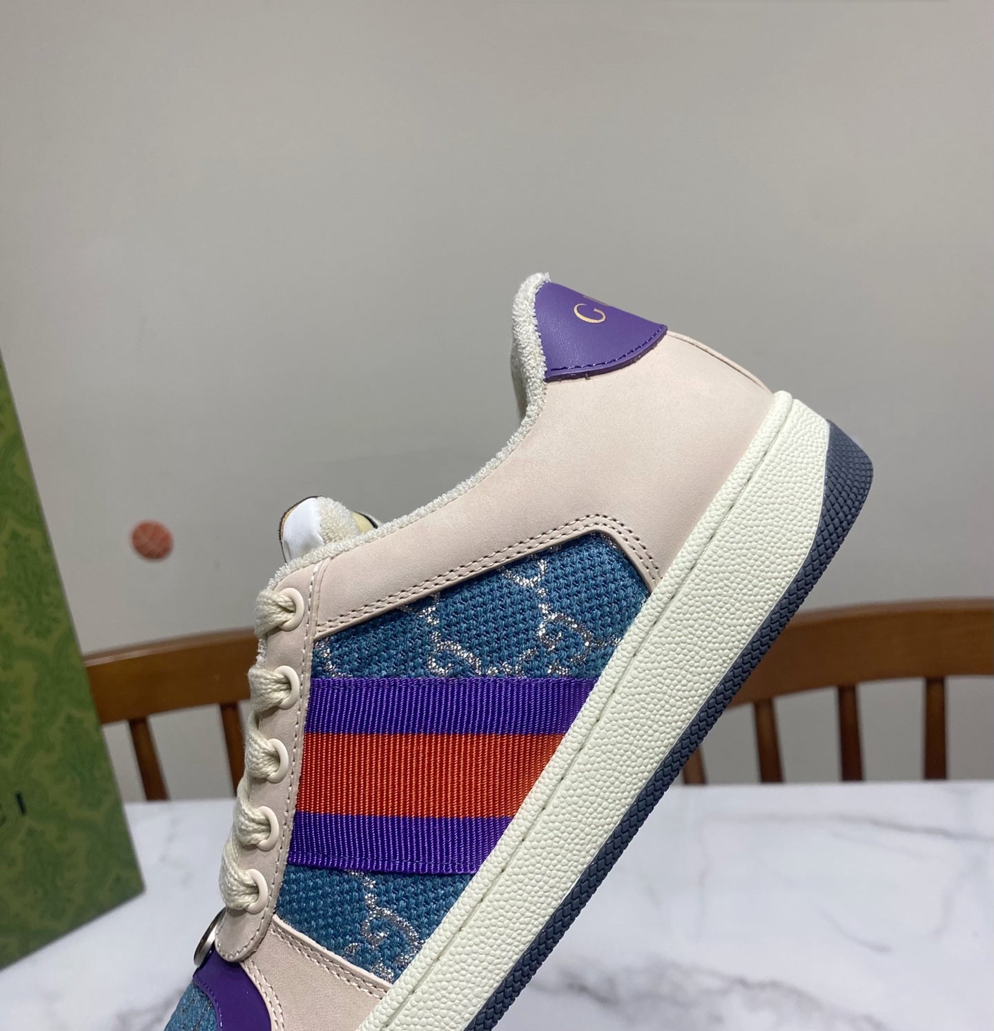 Cream Gucci unisex sneaker with blue patterned panel and multicolor web stripe