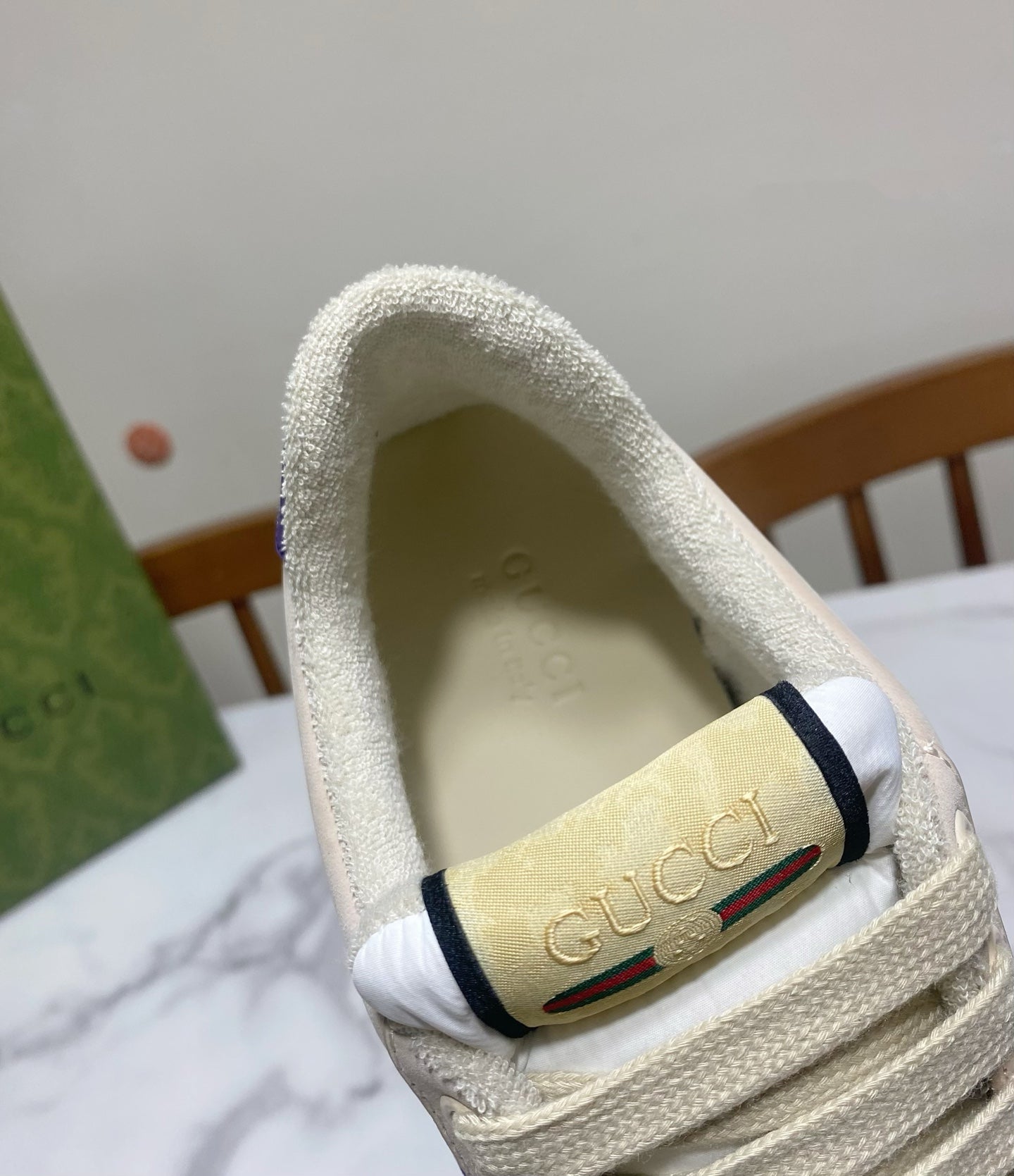 Gucci unisex sneaker interior heel lining with raised logo patch