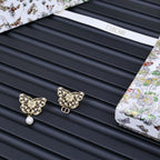 Dior gold-tone butterfly stud earrings with pearl drop accents