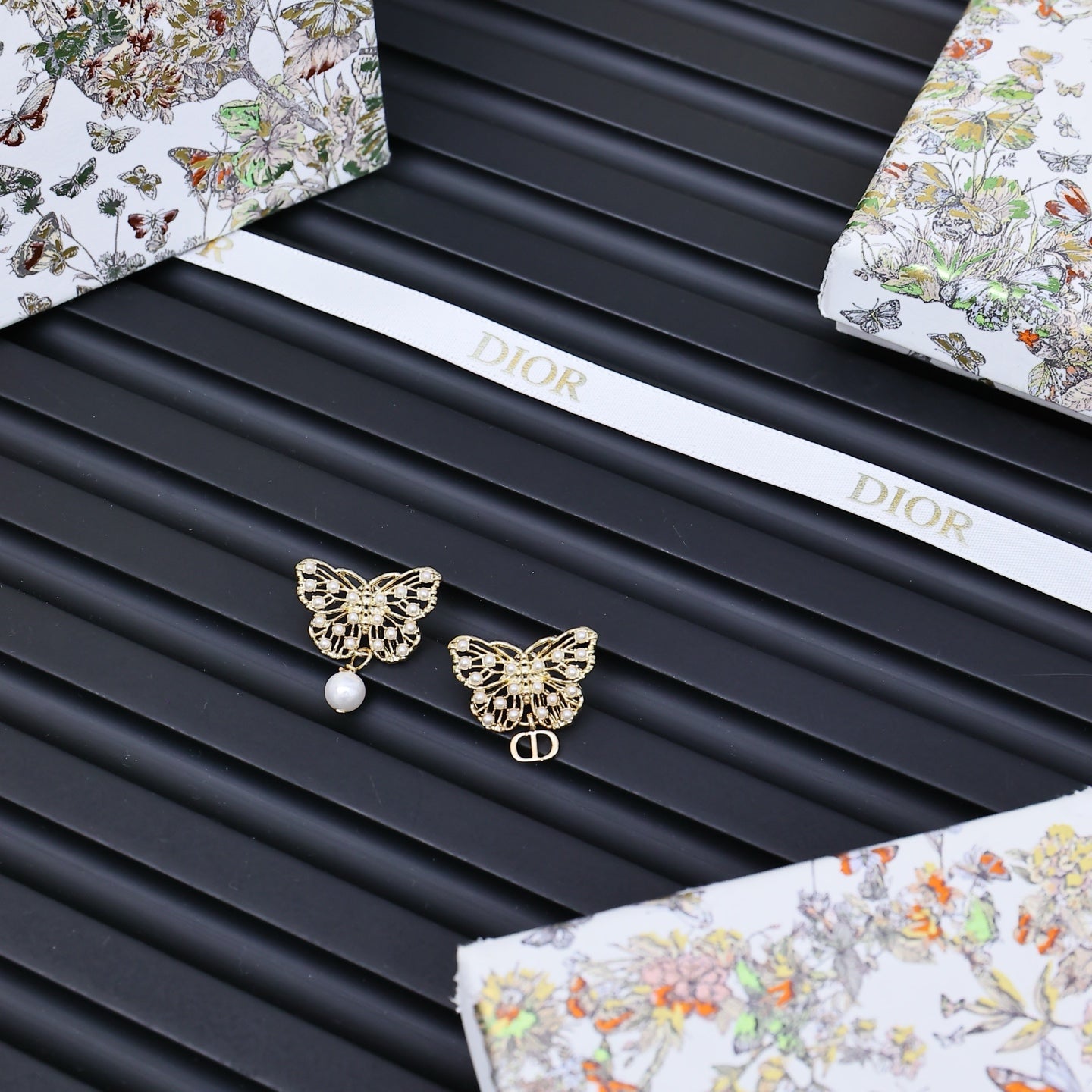 Dior gold-tone butterfly earrings with pearl drops