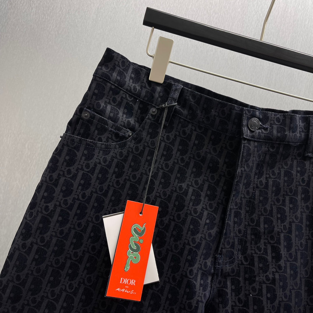 Dior logo-pattern shorts, front view with waistband and dark button