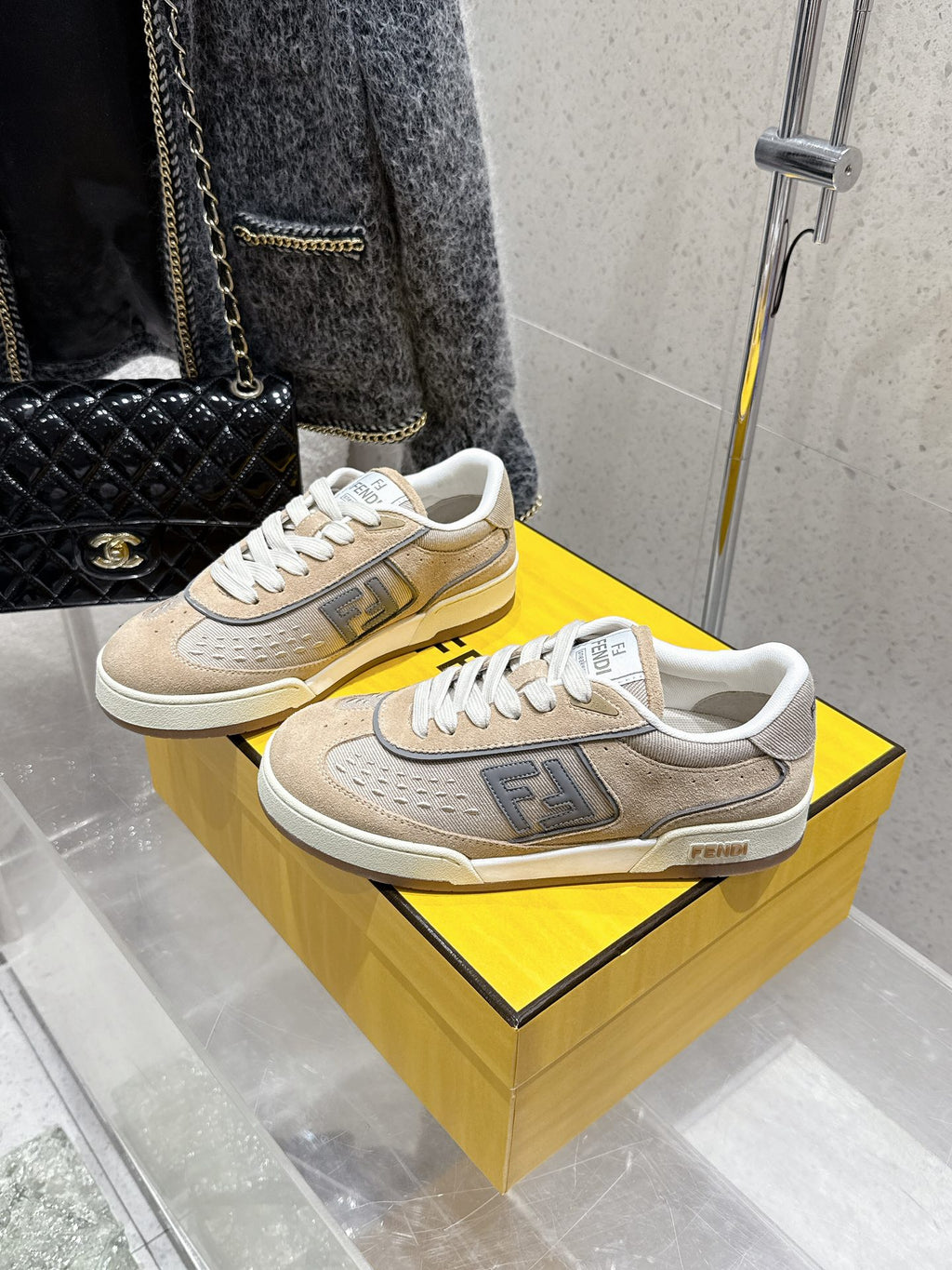 Fendi unisex sneakers on box, beige uppers, white laces, side logo panel