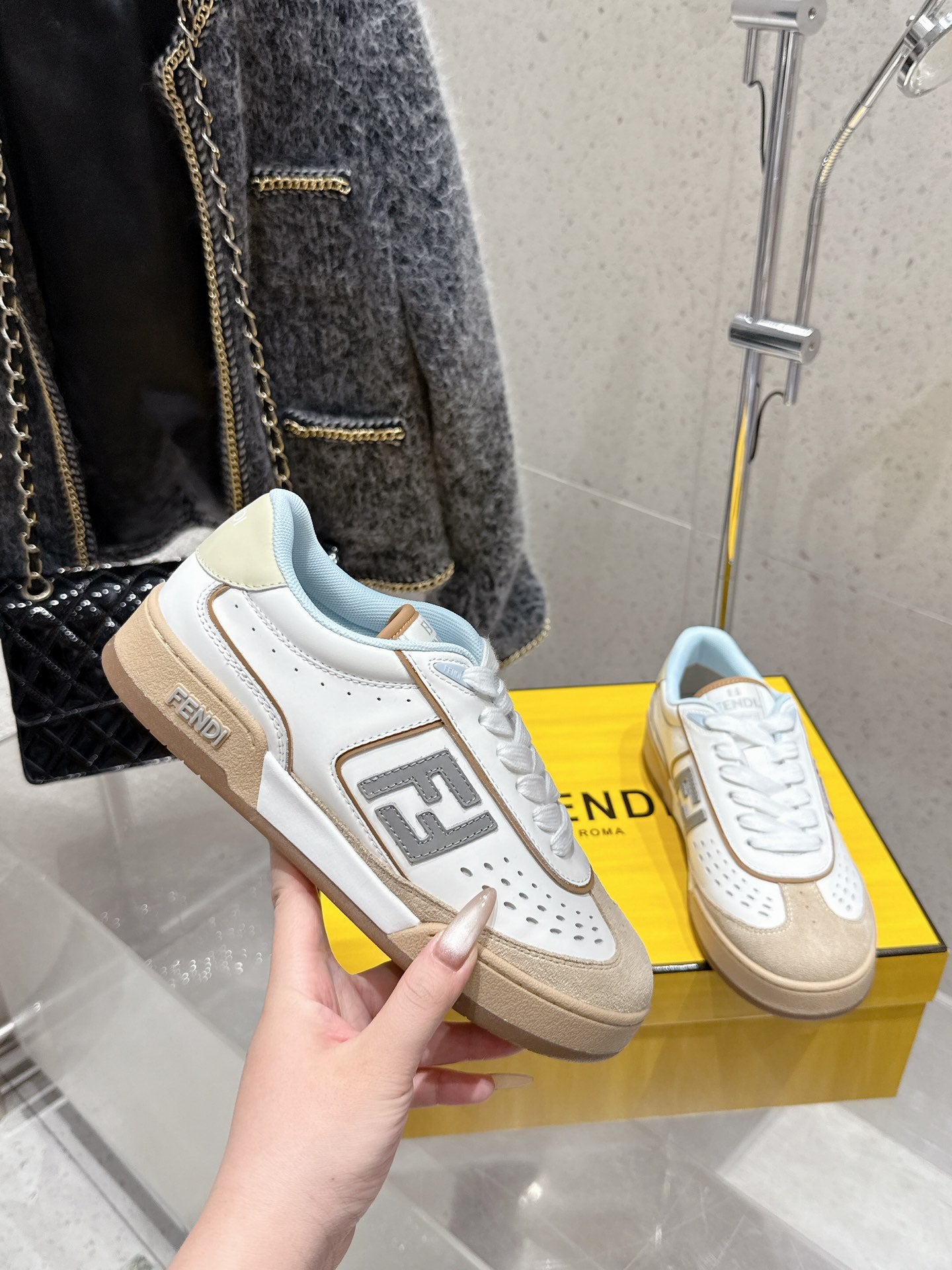 Fendi unisex sneakers with white uppers, tan panels and gray logo block, lace-up