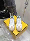 Fendi unisex sneakers with white uppers, beige and gray accents, lace-up design