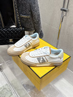 Fendi unisex sneakers, white and beige colorway with bold logo patch, lace-up