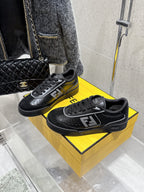 Fendi unisex low-top sneakers on box, black with FF side logo and laces