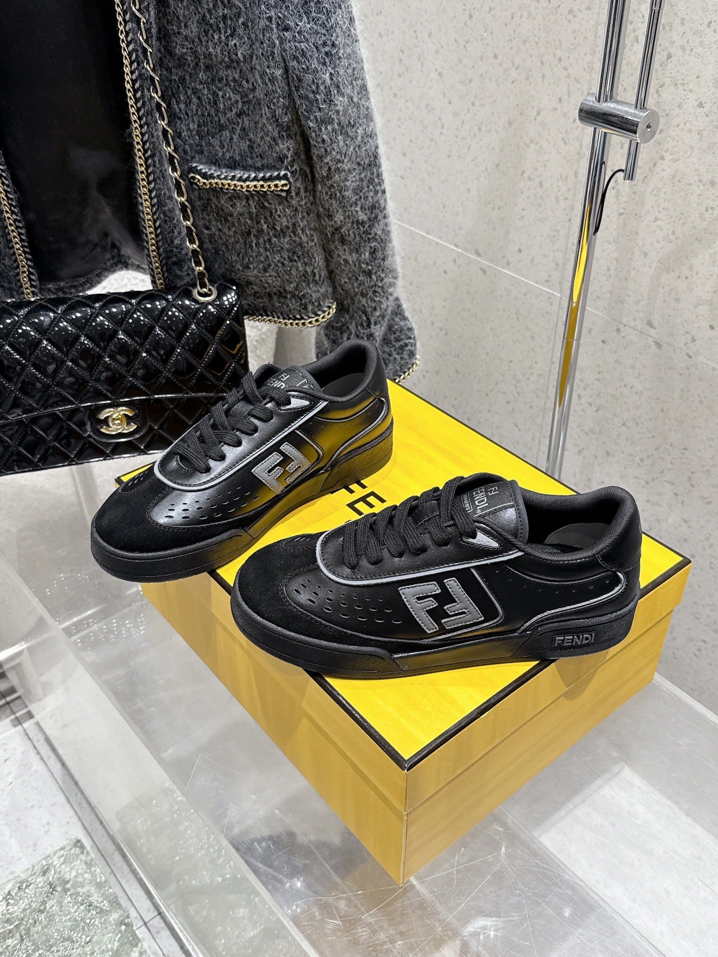 Fendi unisex low-top sneakers on box, black with FF side logo and laces