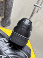Fendi unisex sneakers heel view, black leather with FENDI logo and strap detail
