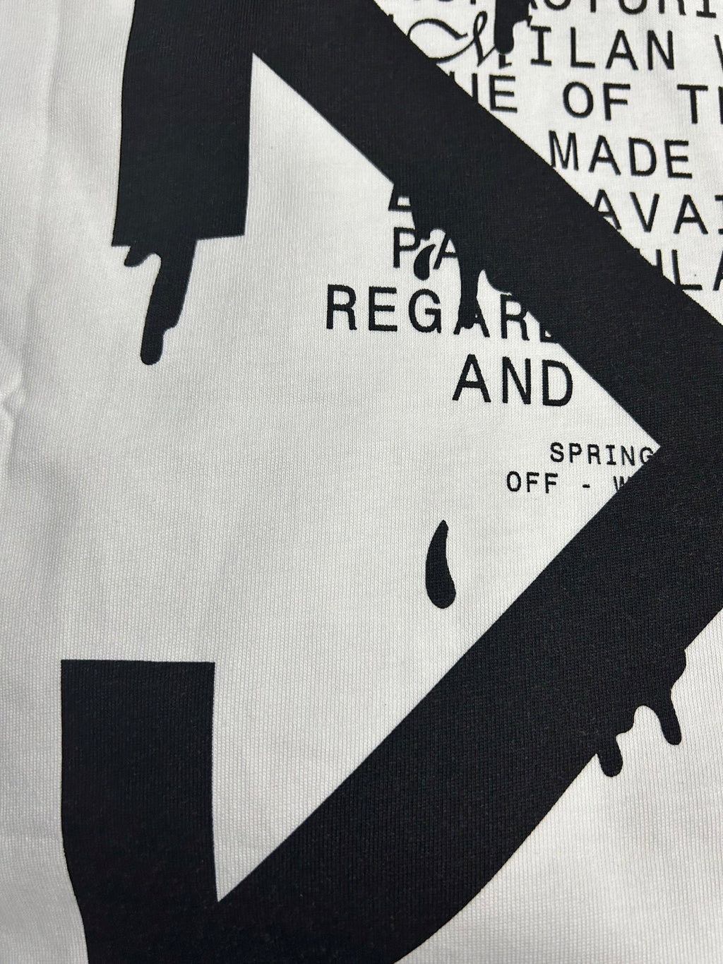 Off White off-white T-shirt close-up of large black logo and dripping shapes