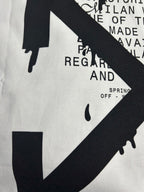 Off White off-white T-shirt close-up of large black logo and dripping shapes