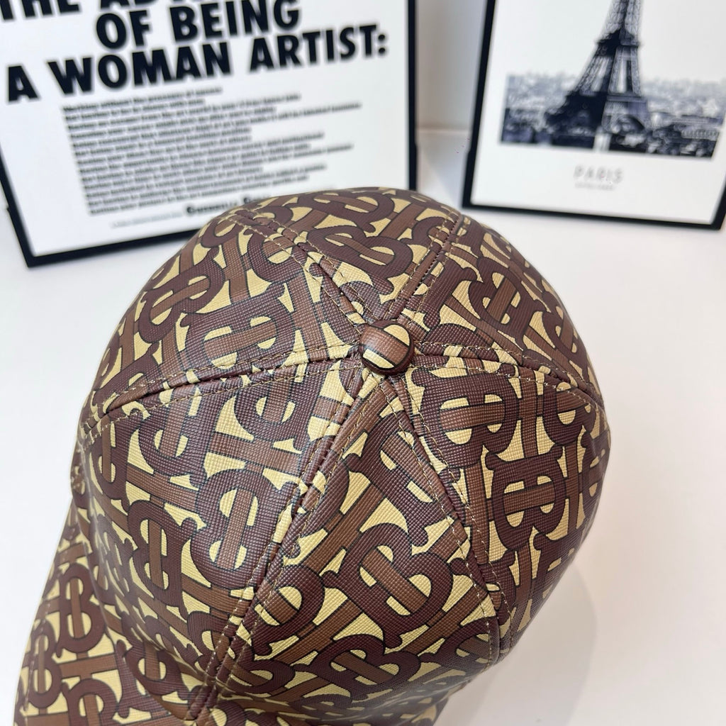 Burberry cap monogram print, top button and stitching detail, curved brim