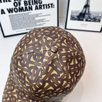 Burberry cap monogram print, top button and stitching detail, curved brim