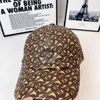 Burberry cap with monogram print, front panel seam, curved brim