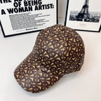 Burberry cap in brown monogram print, curved brim, low crown