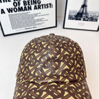Burberry cap with monogram print and top button detail, curved brim