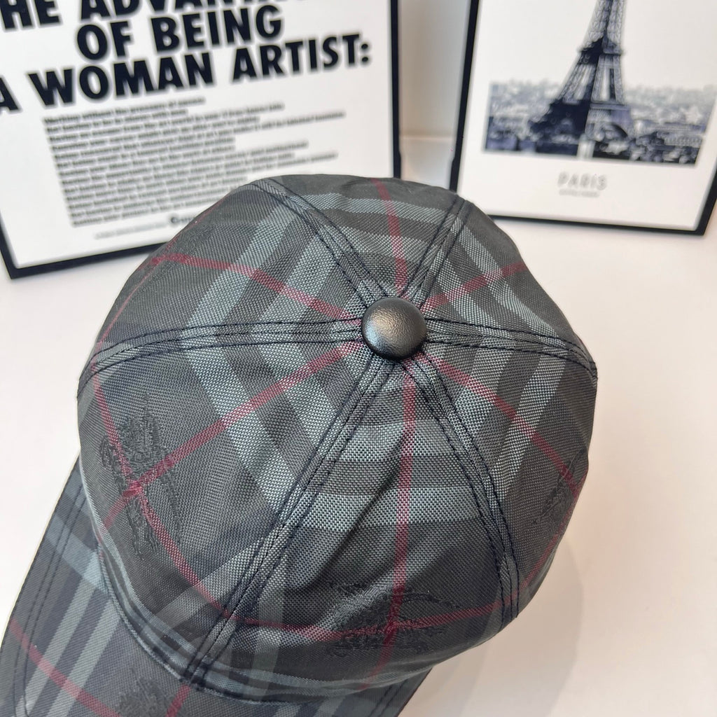 Burberry plaid cap side view with top button and curved brim
