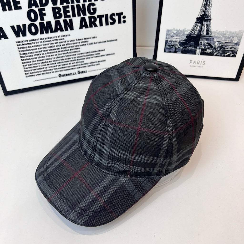 Burberry plaid cap with round top button and curved brim