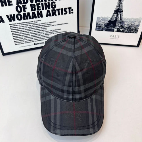 Burberry dark plaid cap with curved brim and stitched crown panels
