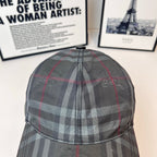 Burberry plaid cap top view with curved brim and gathered crown