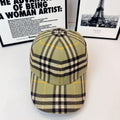 Burberry plaid cap in olive with black and yellow checks, curved brim