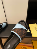 Single blue slide sandal with brown FF-logo band and light blue edge trim