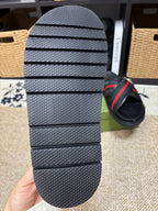 Gucci black rubber sandal sole with textured tread and stacked grip ridges