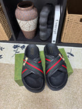 Gucci black slide sandals with green red web stripe and gold logo detail
