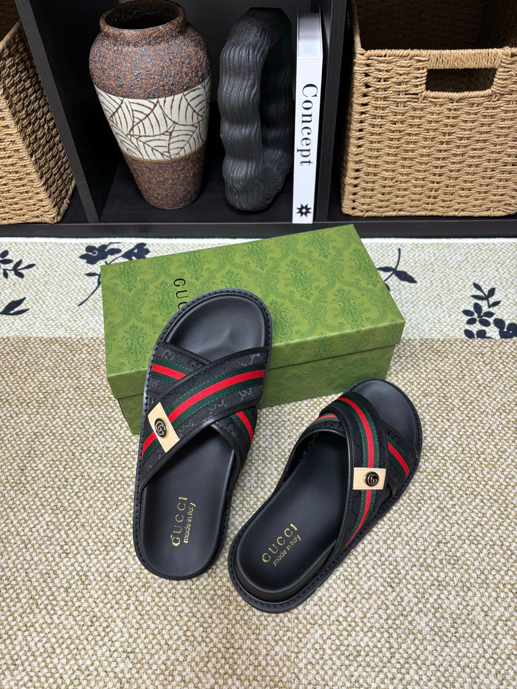 Gucci black slide sandals on green box, red green web strap with metal badge