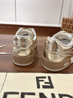 Back view of metallic low-top sneakers with Fendi logo on heel and tongue