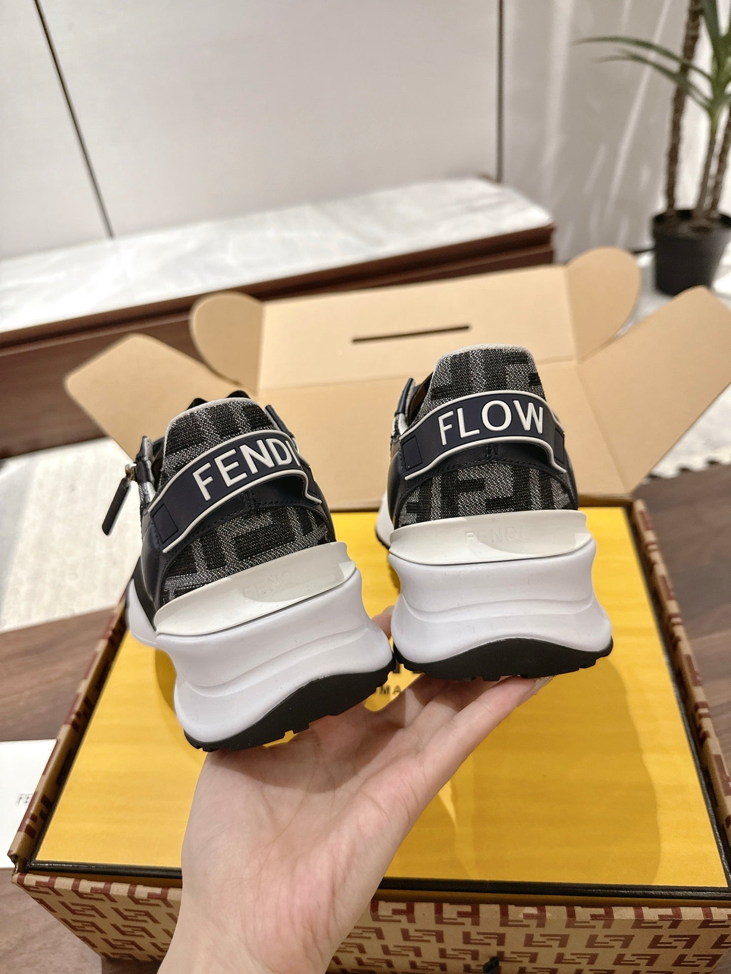FENDI Flow sneakers with black knit back, white sole and FLOW heel print