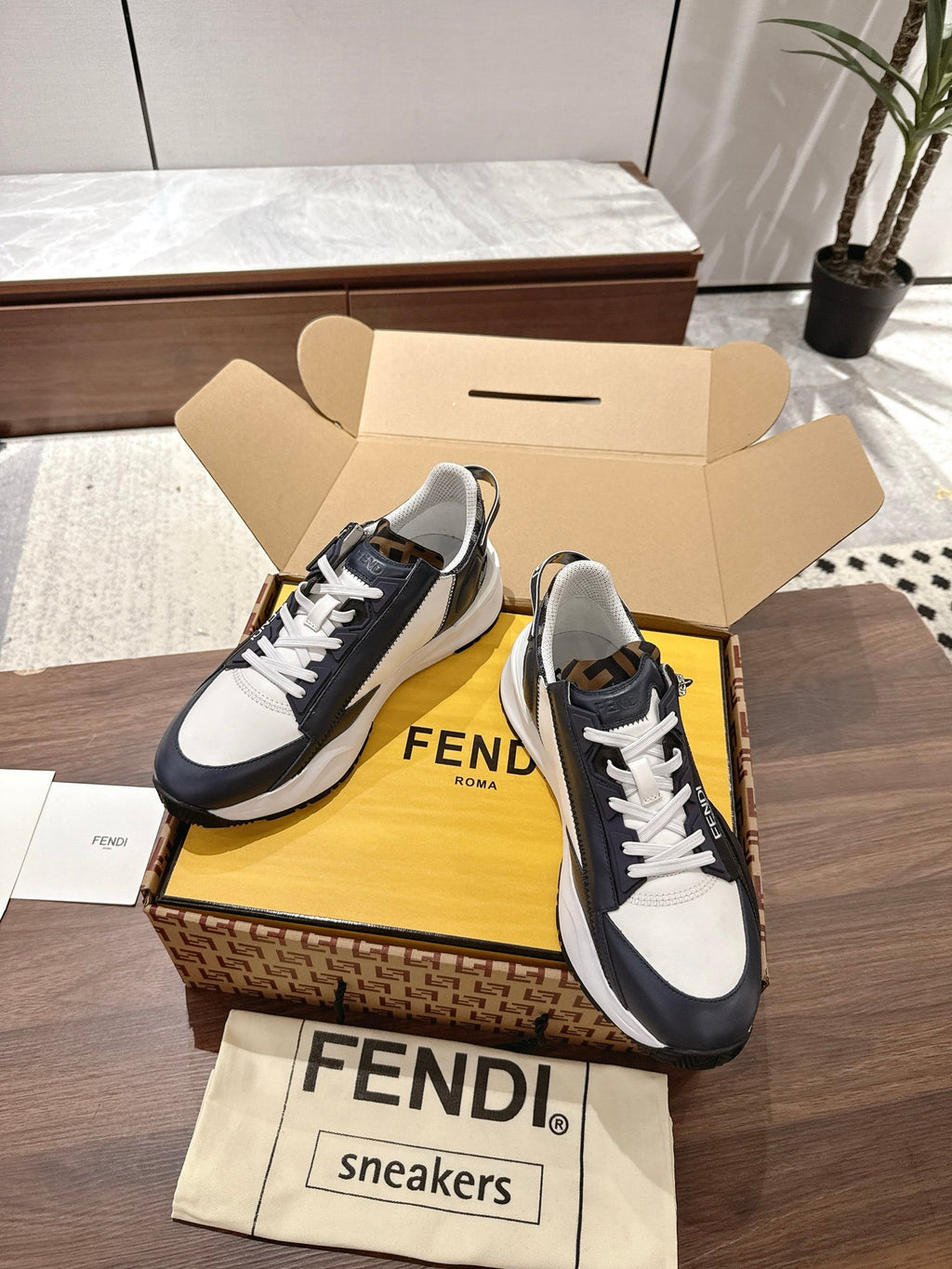 White and navy lace-up sneakers with FENDI Roma side print, boxed pair