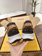 Unisex Fendi sneakers back view, brown logo heels with white midsole and black strap