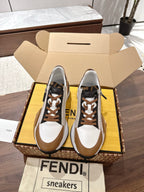 Fendi unisex sneakers with lace-up front, brown trim, black accents, and white toe caps