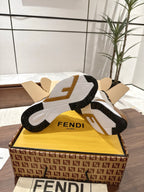 Fendi unisex sneakers outsole view with chunky tread and brown, black, and white colors