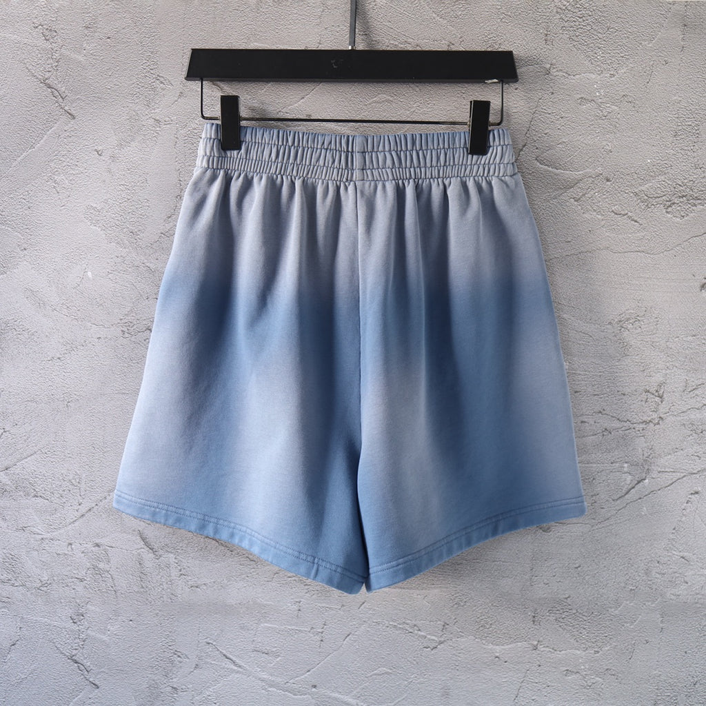 Light blue denim shorts with elastic waistband and relaxed fit