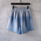 Light blue denim shorts with elastic waistband and relaxed fit