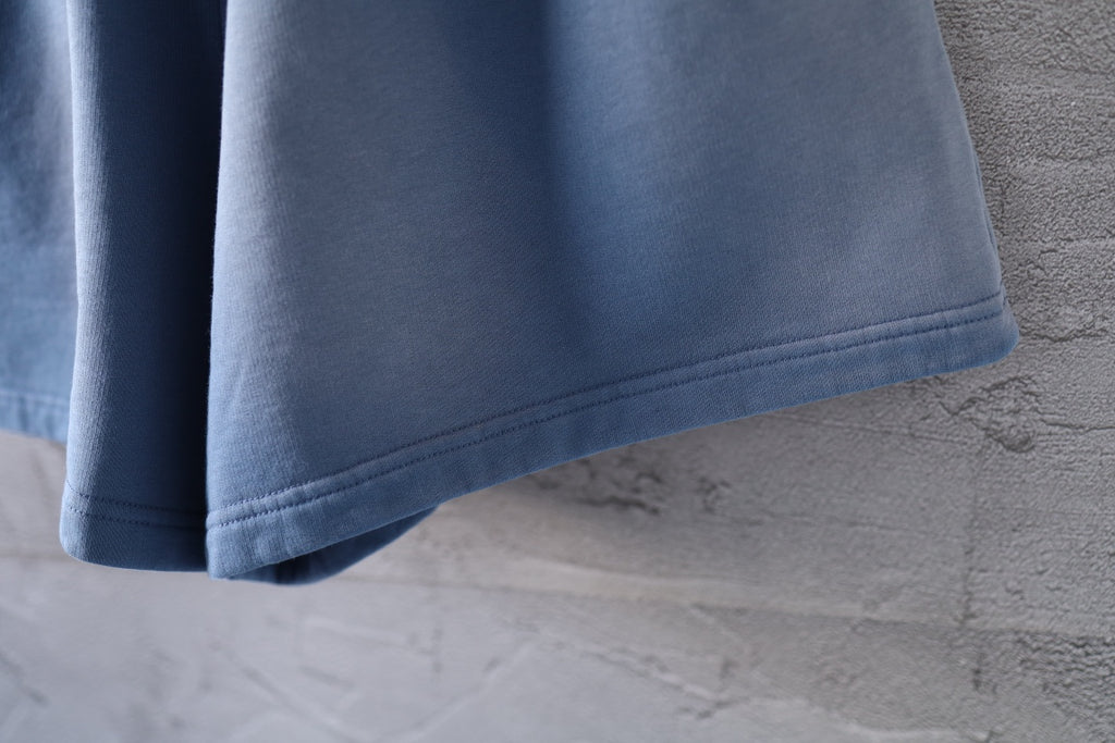 Light blue denim shorts with straight hem and side stitching detail