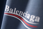 Balenciaga logo graphic on light blue fabric