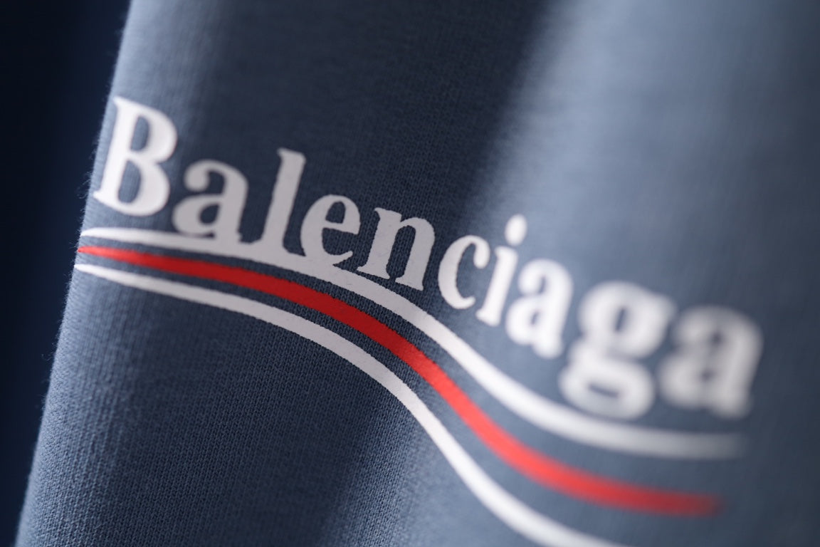 Balenciaga logo graphic on light blue fabric
